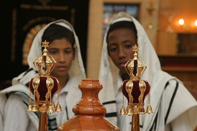 image of two dark skinned boys having a Bar Mitzvah